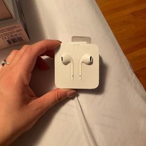 Apple head phones. Brand new. NEVER used. Still in box